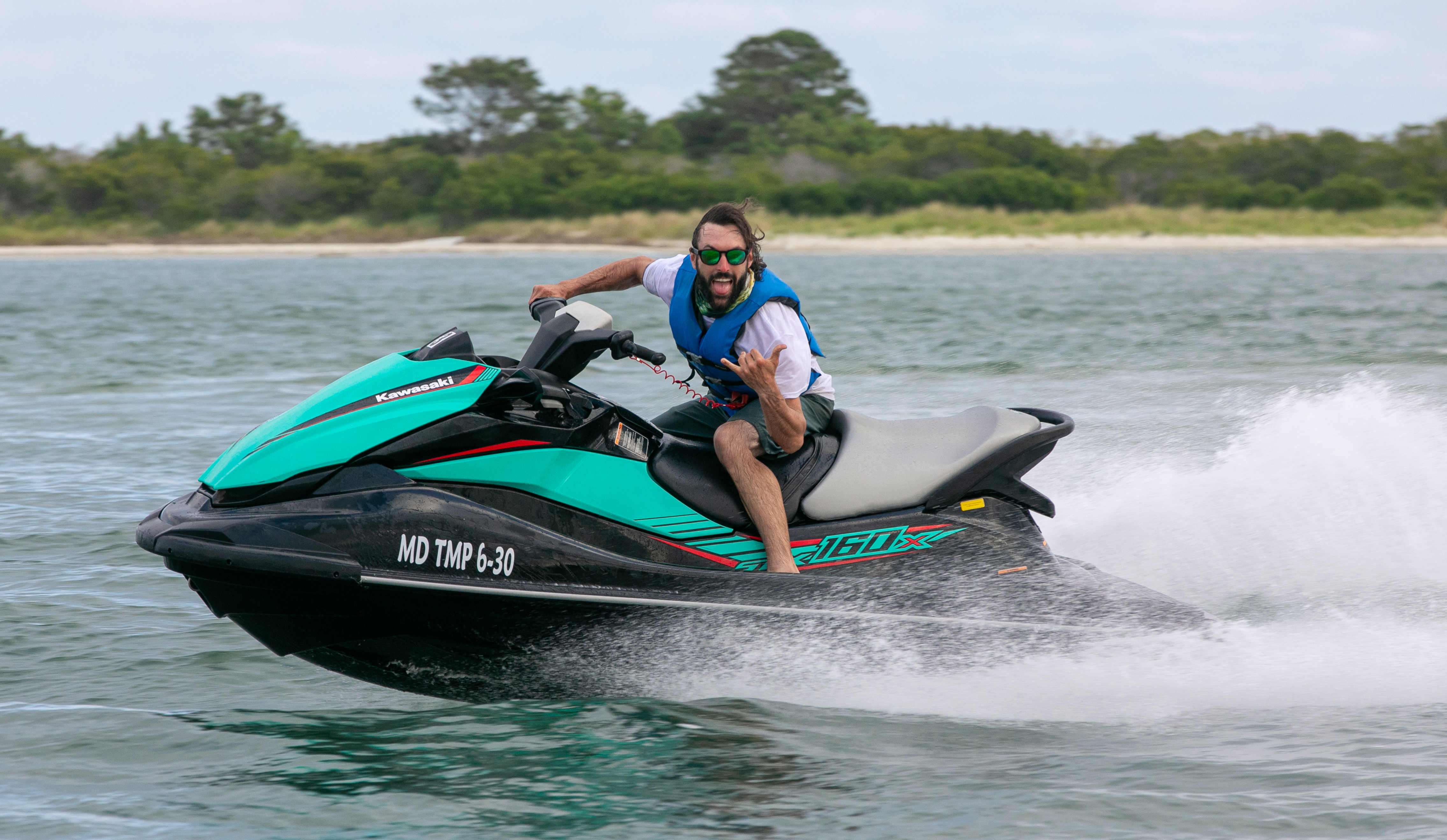 Jet ski riders on the open water