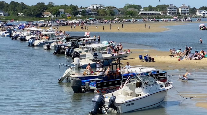 Pontoon boat on the OC bay at OCA Watersports